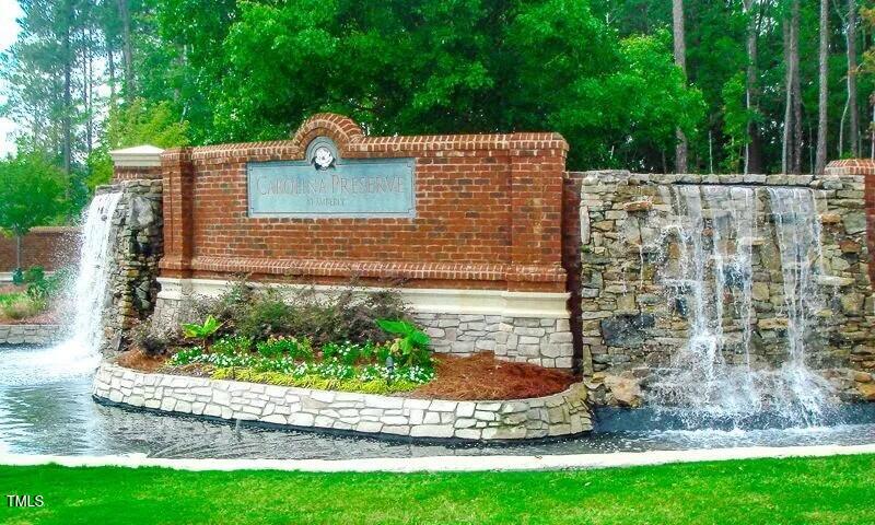 563 Tomkins Loop Cary, NC 27519 - Photo 22 of 26 a backyard of a house with lots of green space