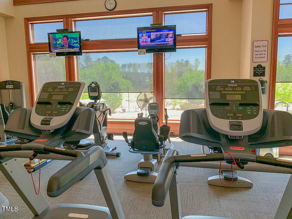 563 Tomkins Loop Cary, NC 27519 - Photo 26 of 26 a room with gym equipment