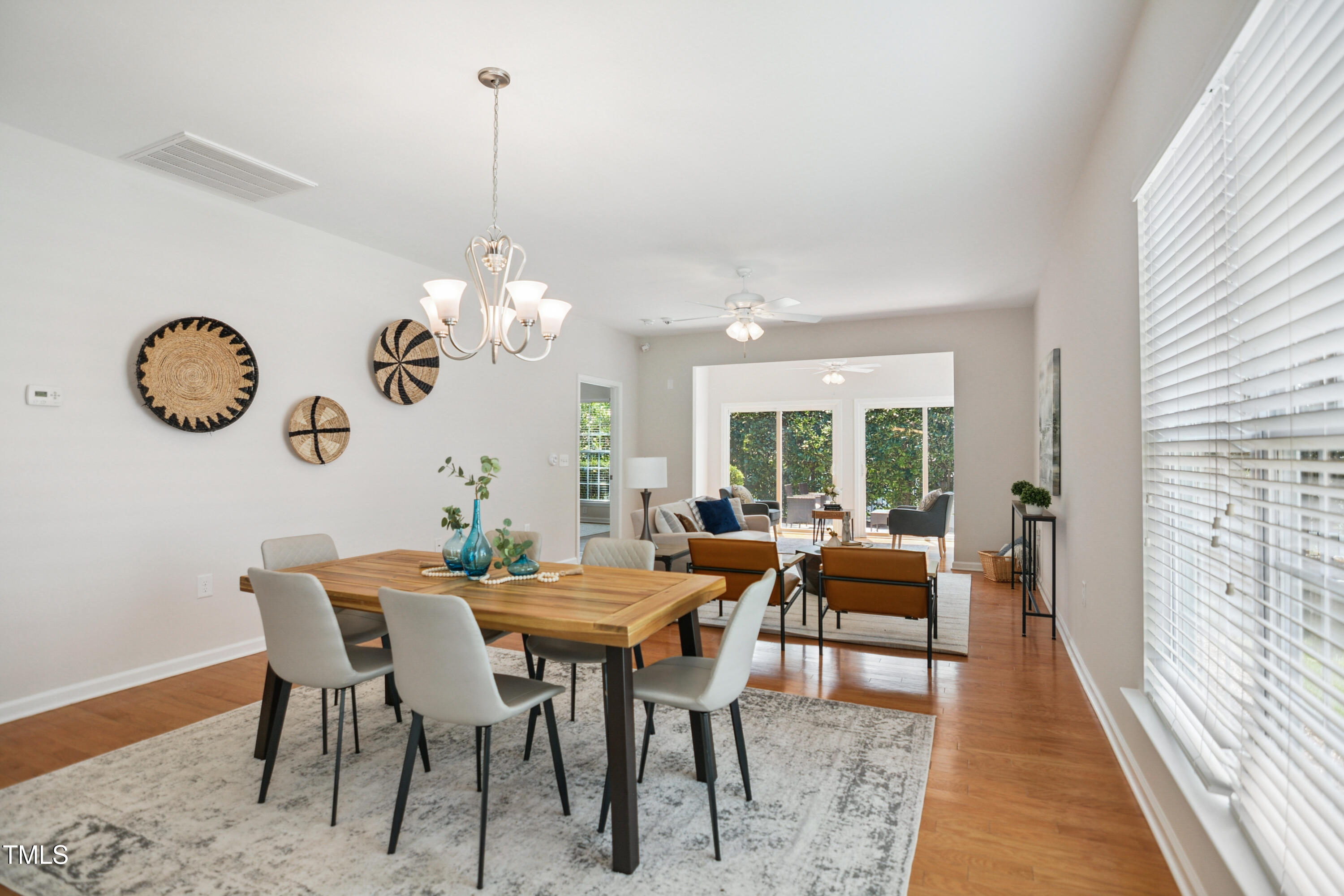 563 Tomkins Loop Cary, NC 27519 - Photo 4 of 26 a view of a dining room with furniture window and outside view