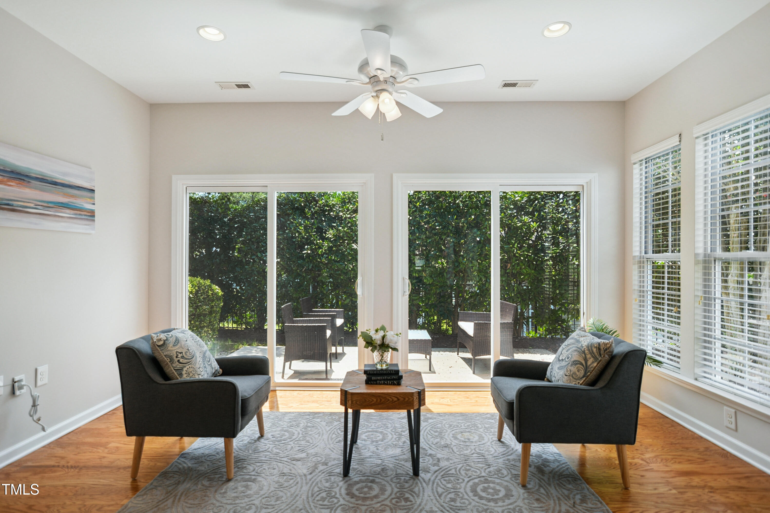 563 Tomkins Loop Cary, NC 27519 - Photo 7 of 26 a living room with furniture and a large window
