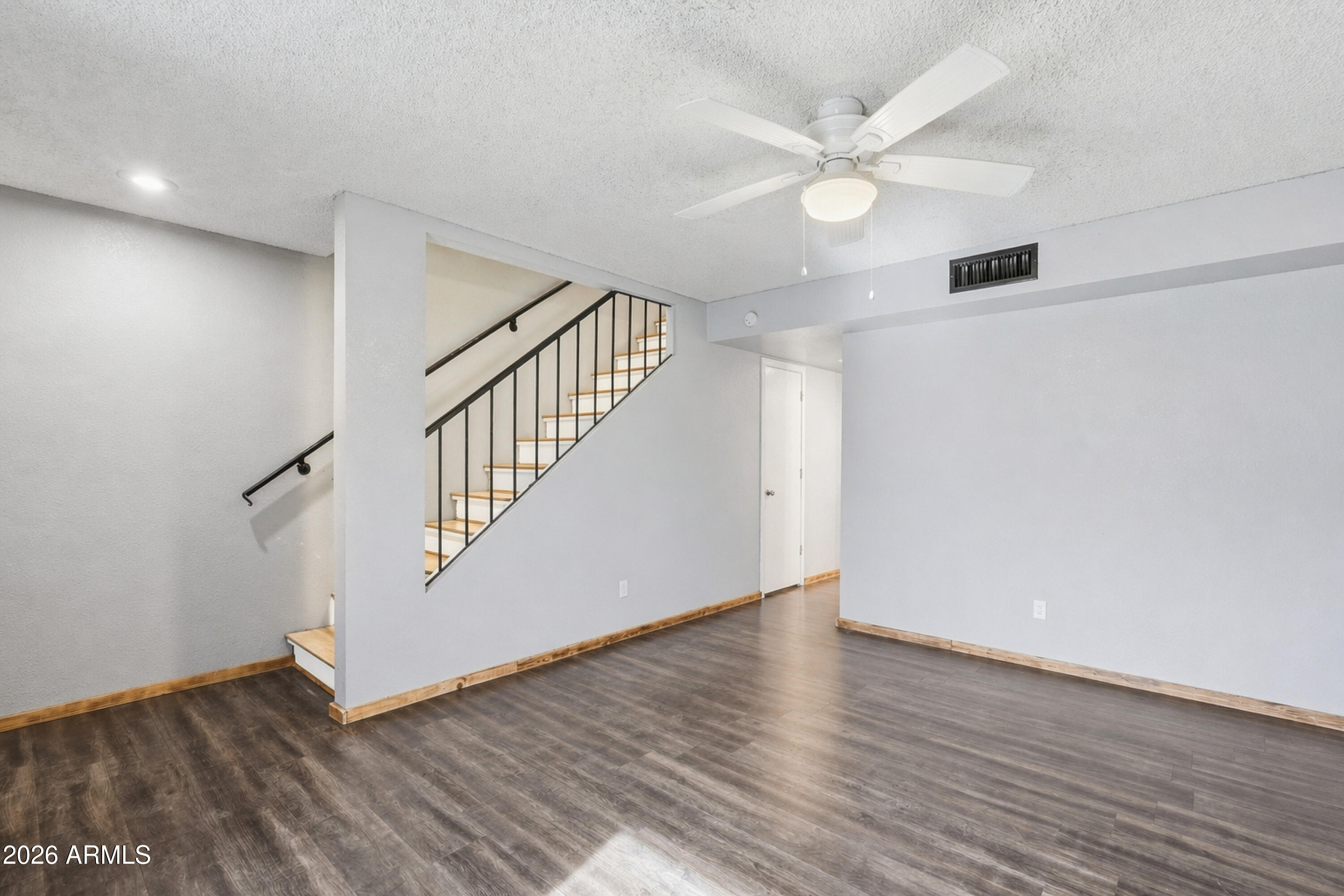 6262 East Brown Road, Unit 10 Mesa, AZ 85205 - Photo 11 of 33 a view of an entryway with wooden floor