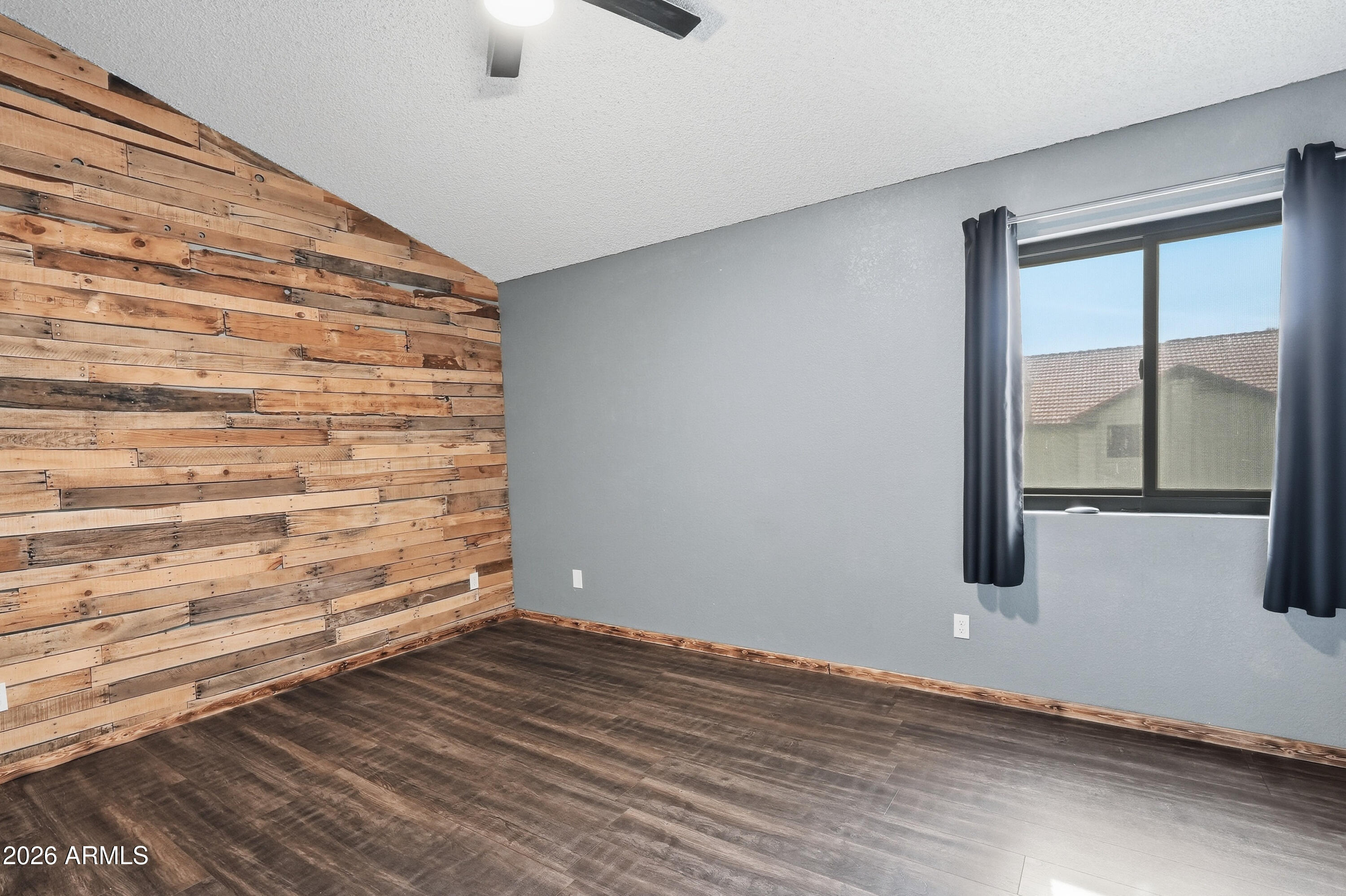 6262 East Brown Road, Unit 10 Mesa, AZ 85205 - Photo 20 of 33 a view of an empty room and window