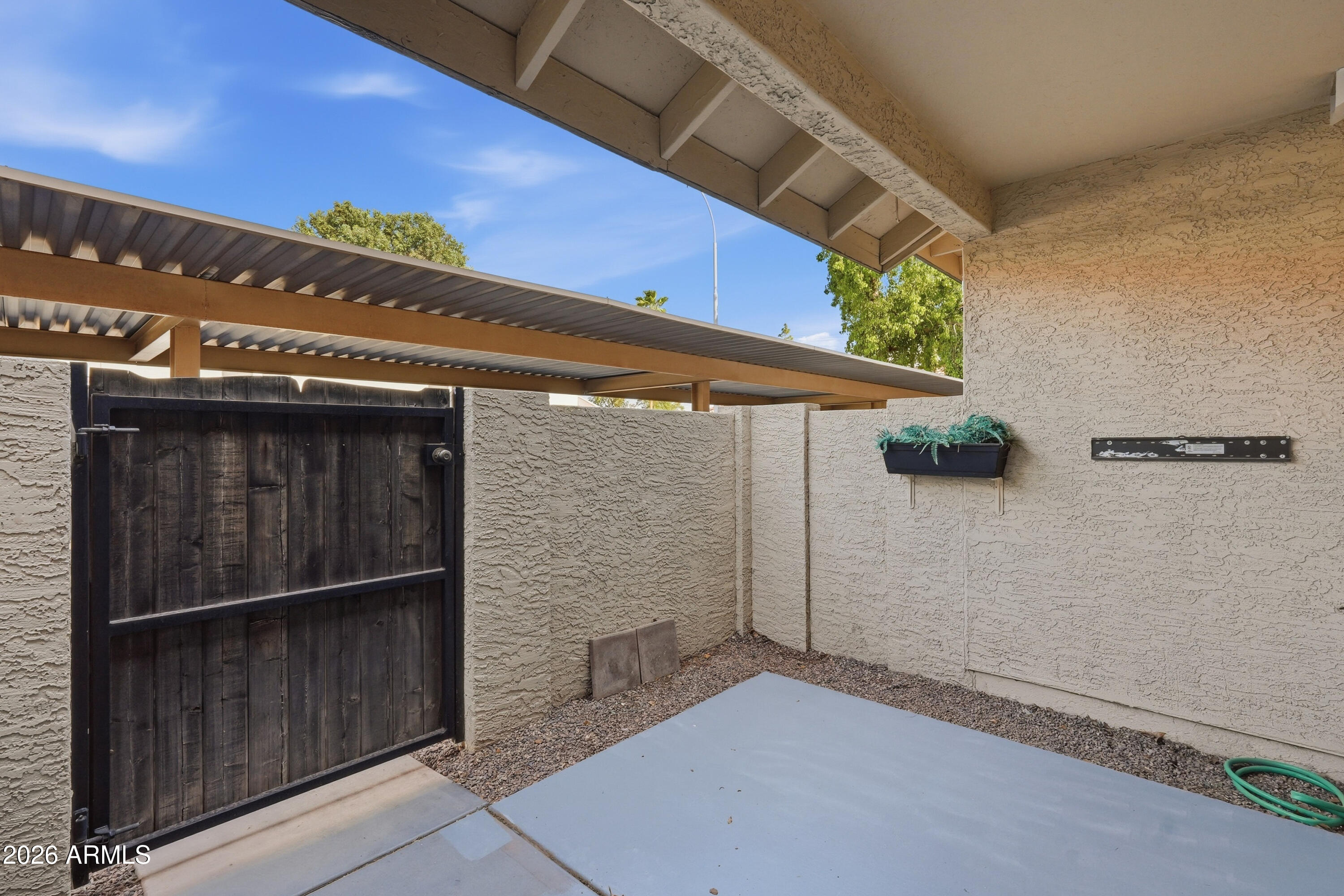 6262 East Brown Road, Unit 10 Mesa, AZ 85205 - Photo 28 of 33 a view of a wooden door
