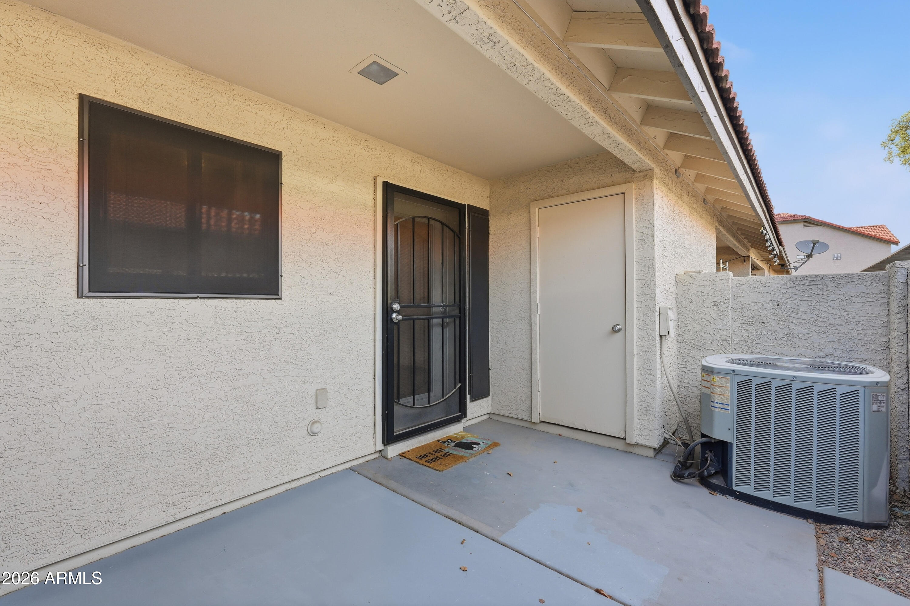 6262 East Brown Road, Unit 10 Mesa, AZ 85205 - Photo 29 of 33 an entryway with a door