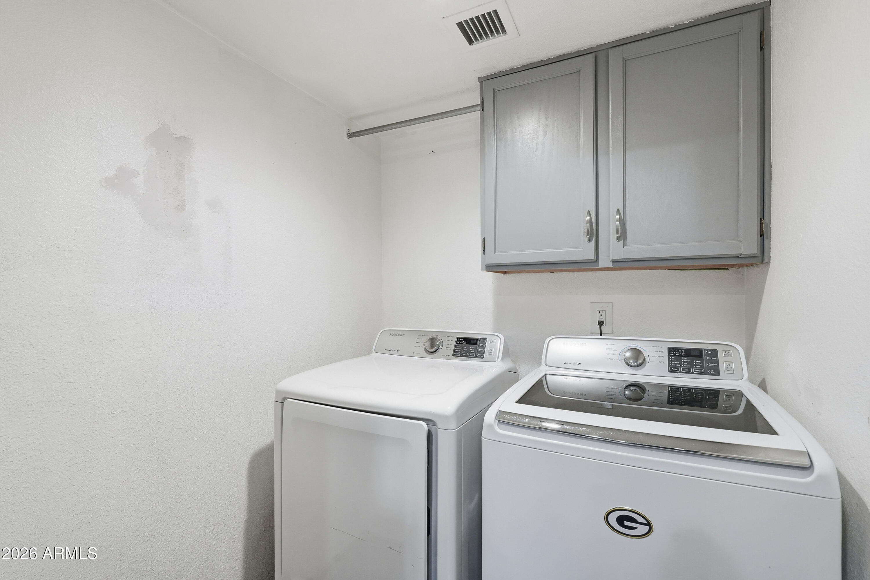 6262 East Brown Road, Unit 10 Mesa, AZ 85205 - Photo 8 of 33 a view of storage and utility room with washer and dryer