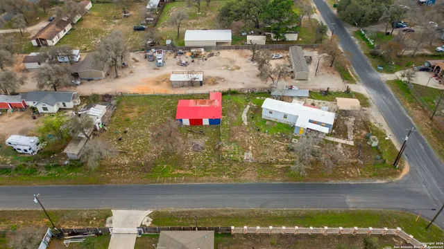 a view of swimming pool with a yard and sitting area