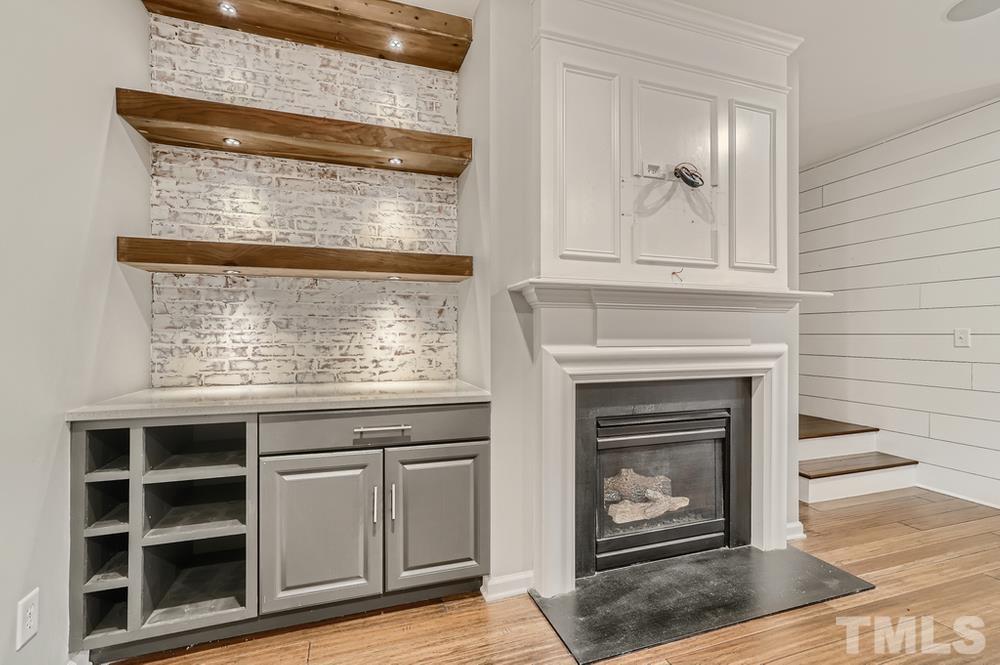 7012 Racine Way Raleigh, NC 27690 - Photo 7 of 28 a stove top oven sitting inside of a kitchen