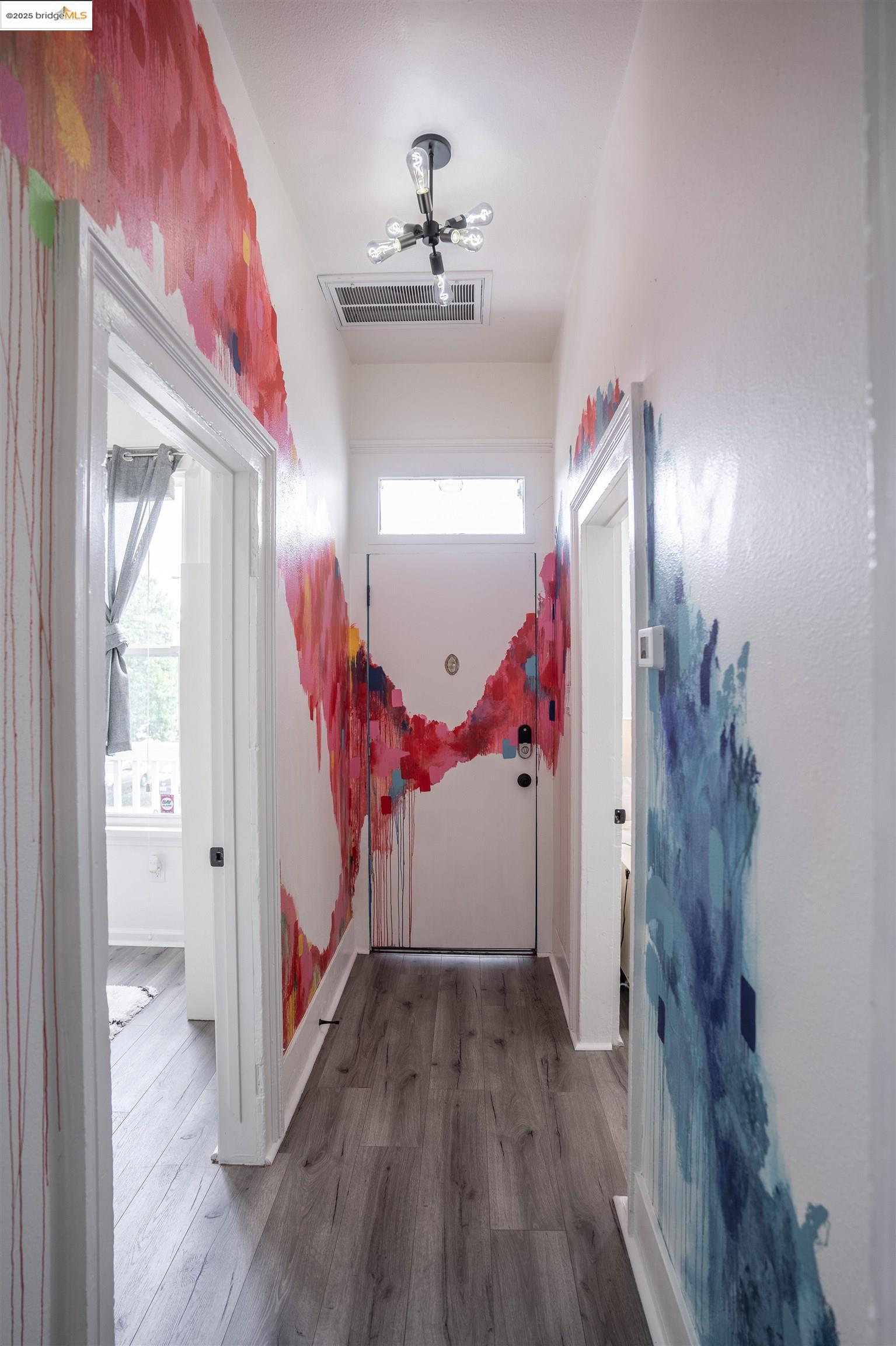 527 Chester Street Oakland, CA 94607 - Photo 39 of 59 Hall with dark wood-style floors
