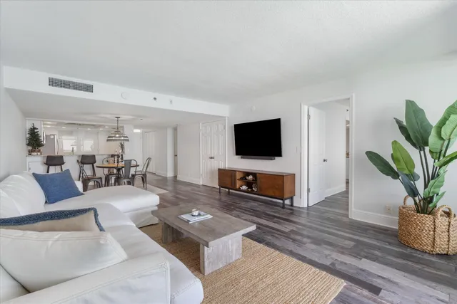 a living room with furniture and a table