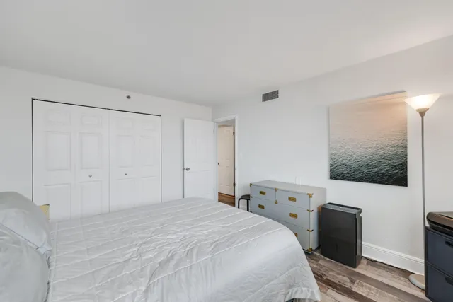 a kitchen with stainless steel appliances granite countertop a stove and a refrigerator
