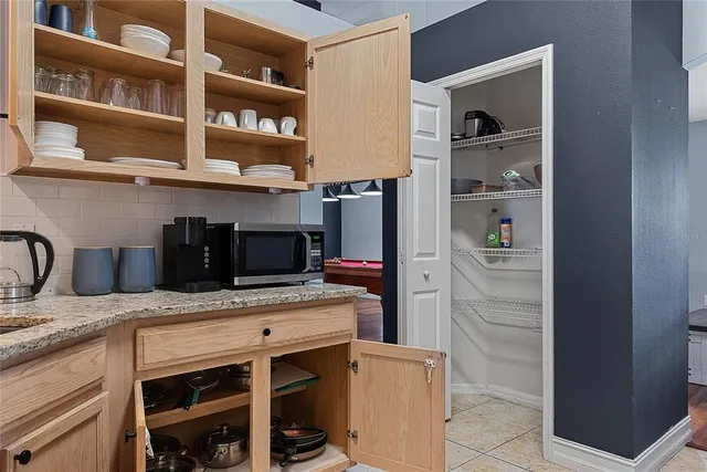 a kitchen with stainless steel appliances granite countertop a cabinets and a sink