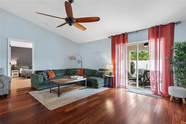 a living room with furniture and a window