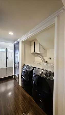 a kitchen with a stove and a refrigerator