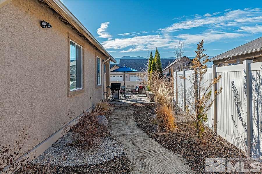 2201 Dominic Drive Reno, NV 89521 - Photo 18 of 20 a view of a house with a yard