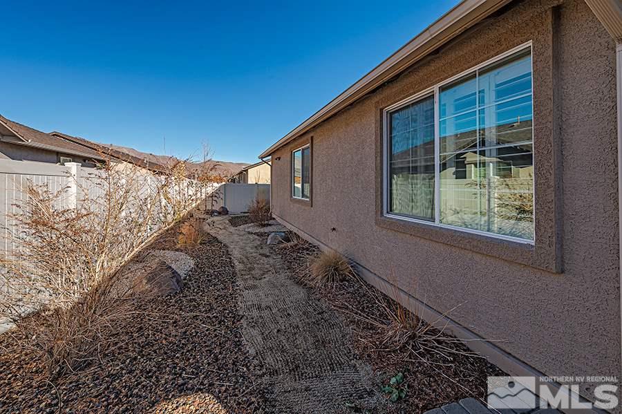 2201 Dominic Drive Reno, NV 89521 - Photo 19 of 20 a backyard of a house with lots of green space