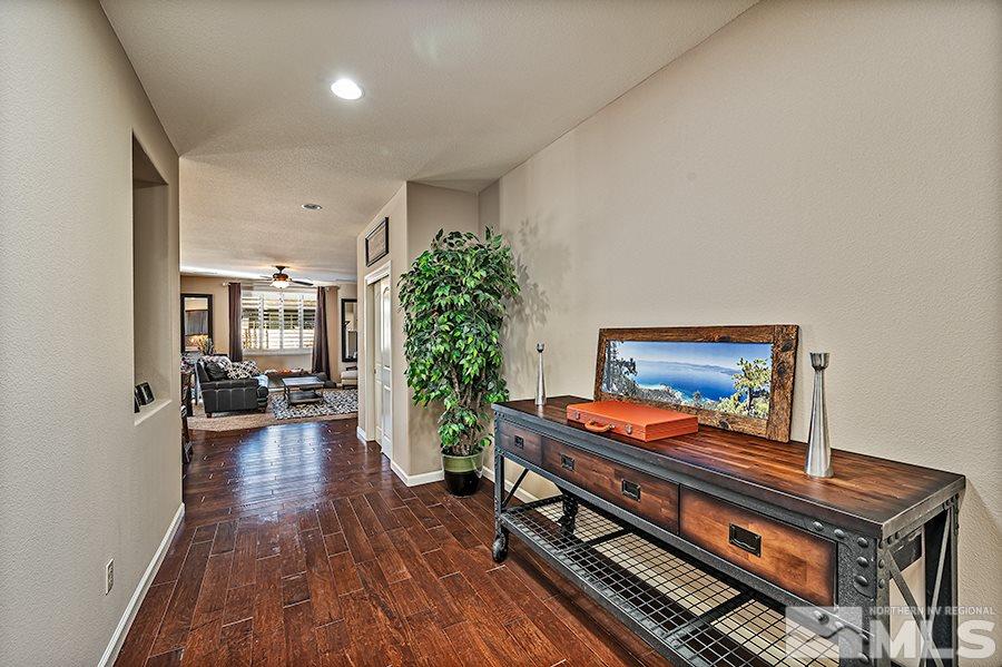 2201 Dominic Drive Reno, NV 89521 - Photo 2 of 20 a sitting area with furniture and wooden floor