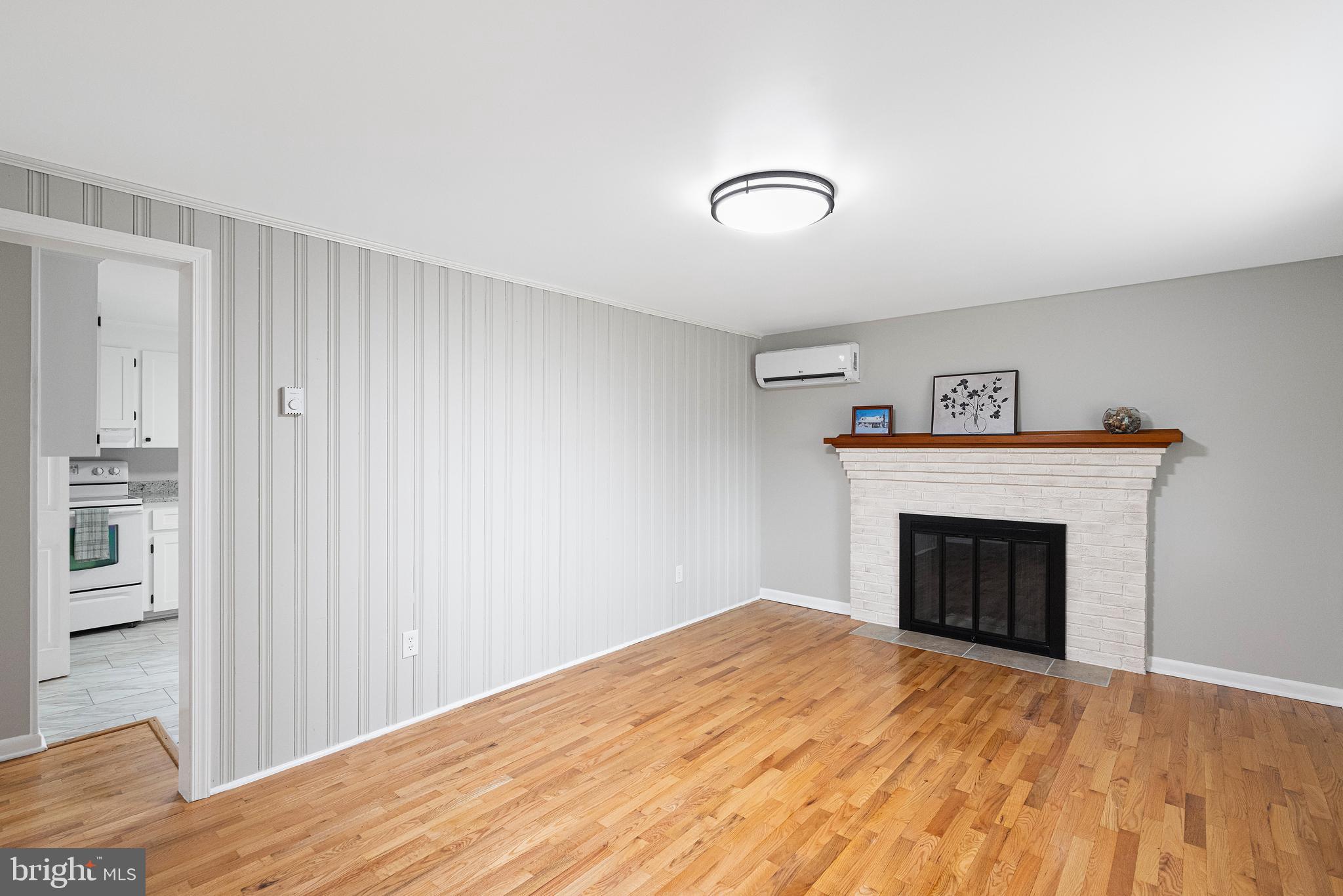 407 Gun Club Road Stephenson, VA 22656 - Photo 7 of 21 Living room showcasing the beautiful wood...