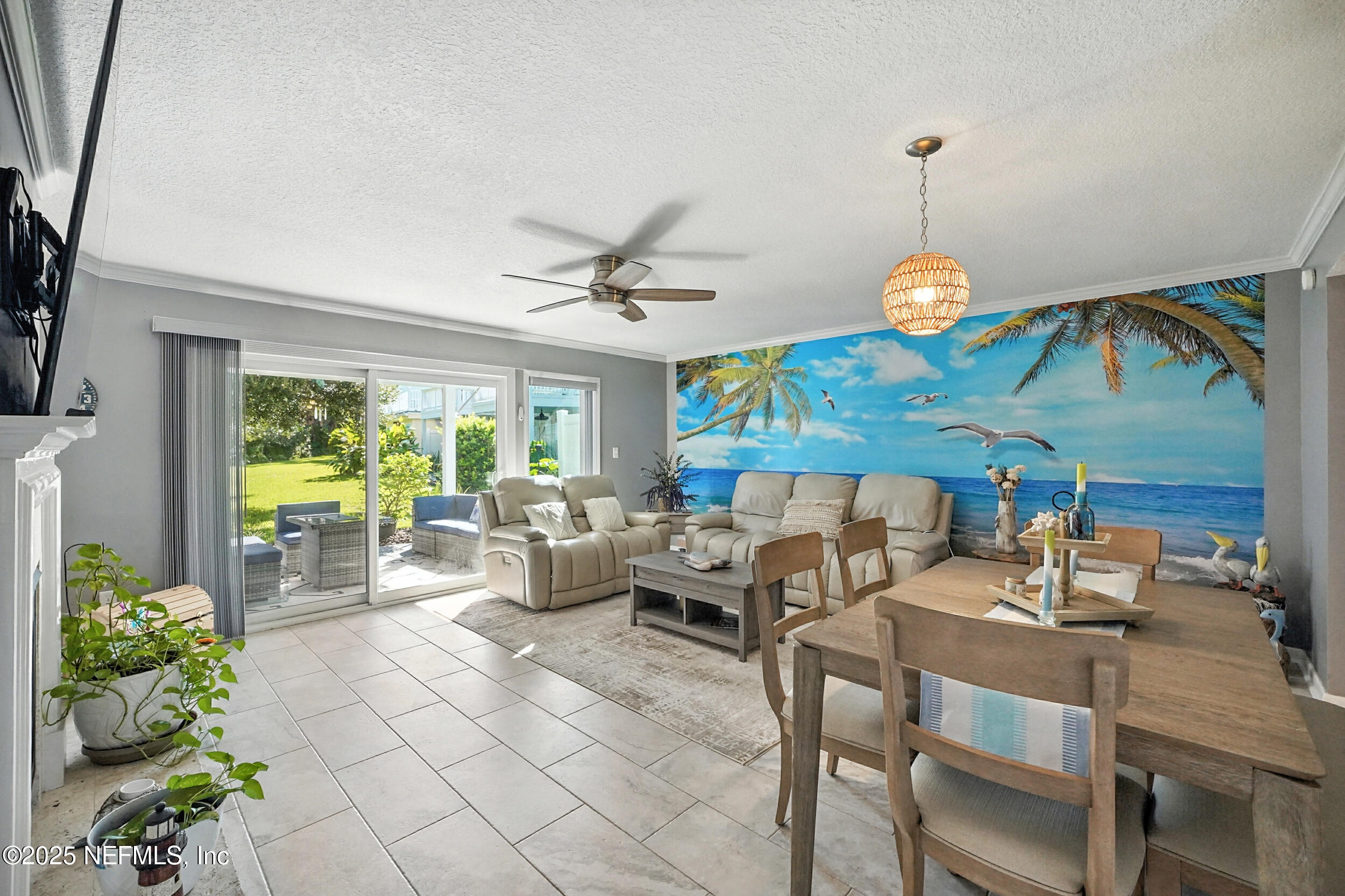 2233 Seminole Road, Unit 3 Atlantic Beach, FL 32233 - Photo 12 of 59 a living room with furniture and a large window