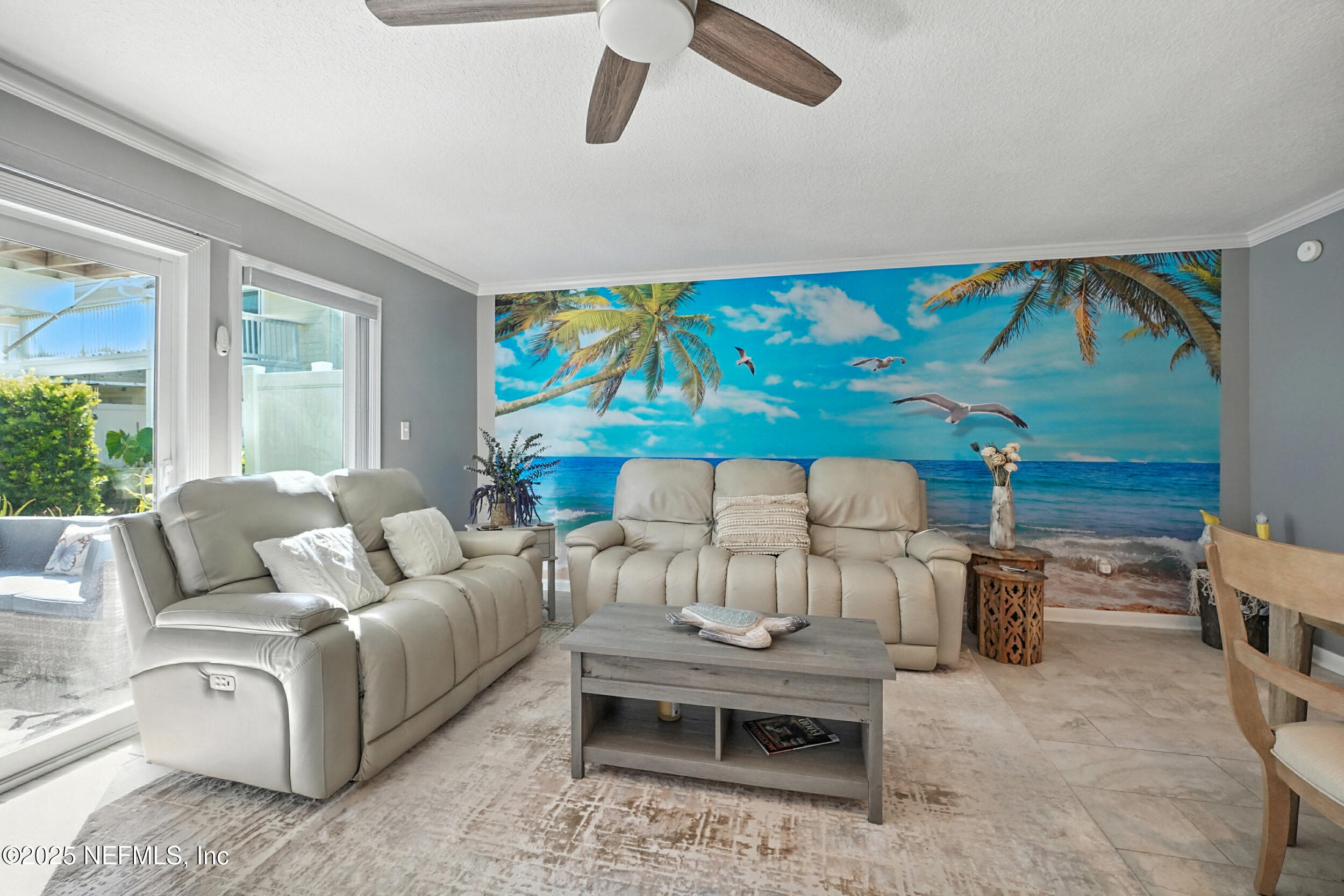 2233 Seminole Road, Unit 3 Atlantic Beach, FL 32233 - Photo 14 of 59 a living room with furniture and a flat screen tv