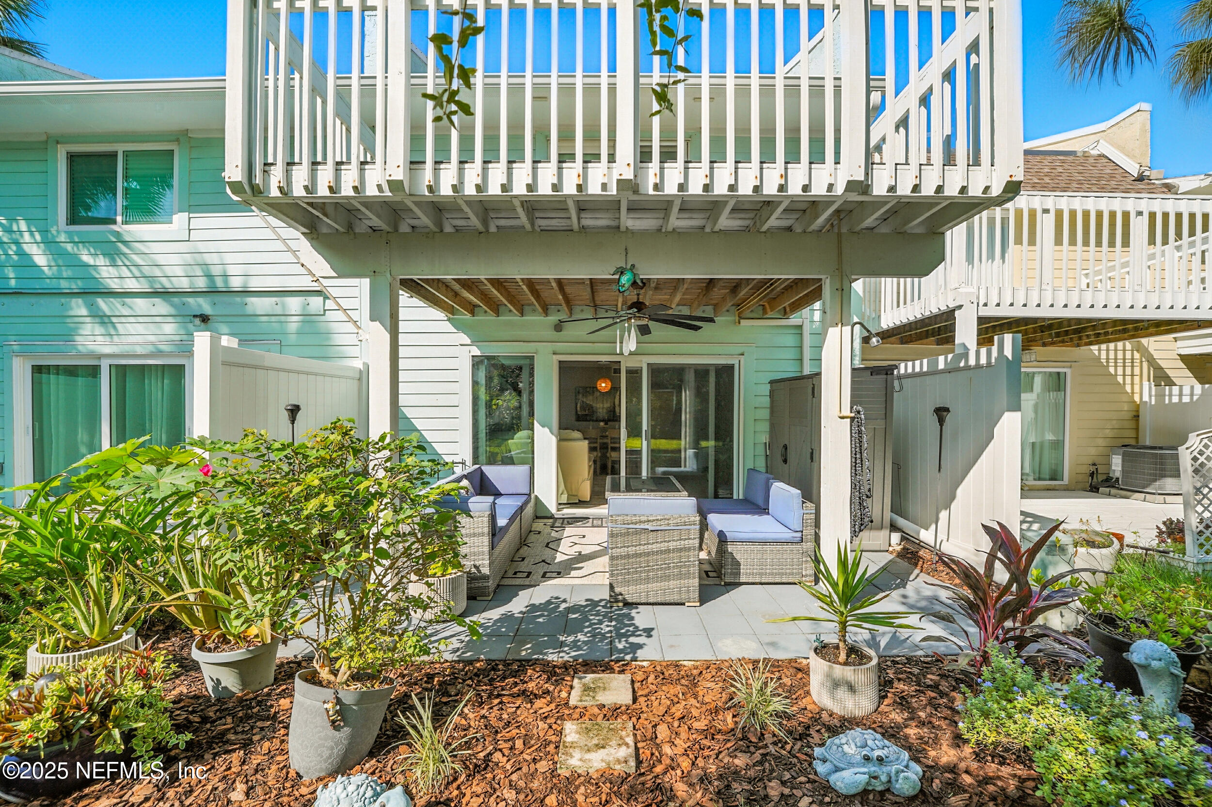 2233 Seminole Road, Unit 3 Atlantic Beach, FL 32233 - Photo 19 of 59 a front view of a house with a garden and plants