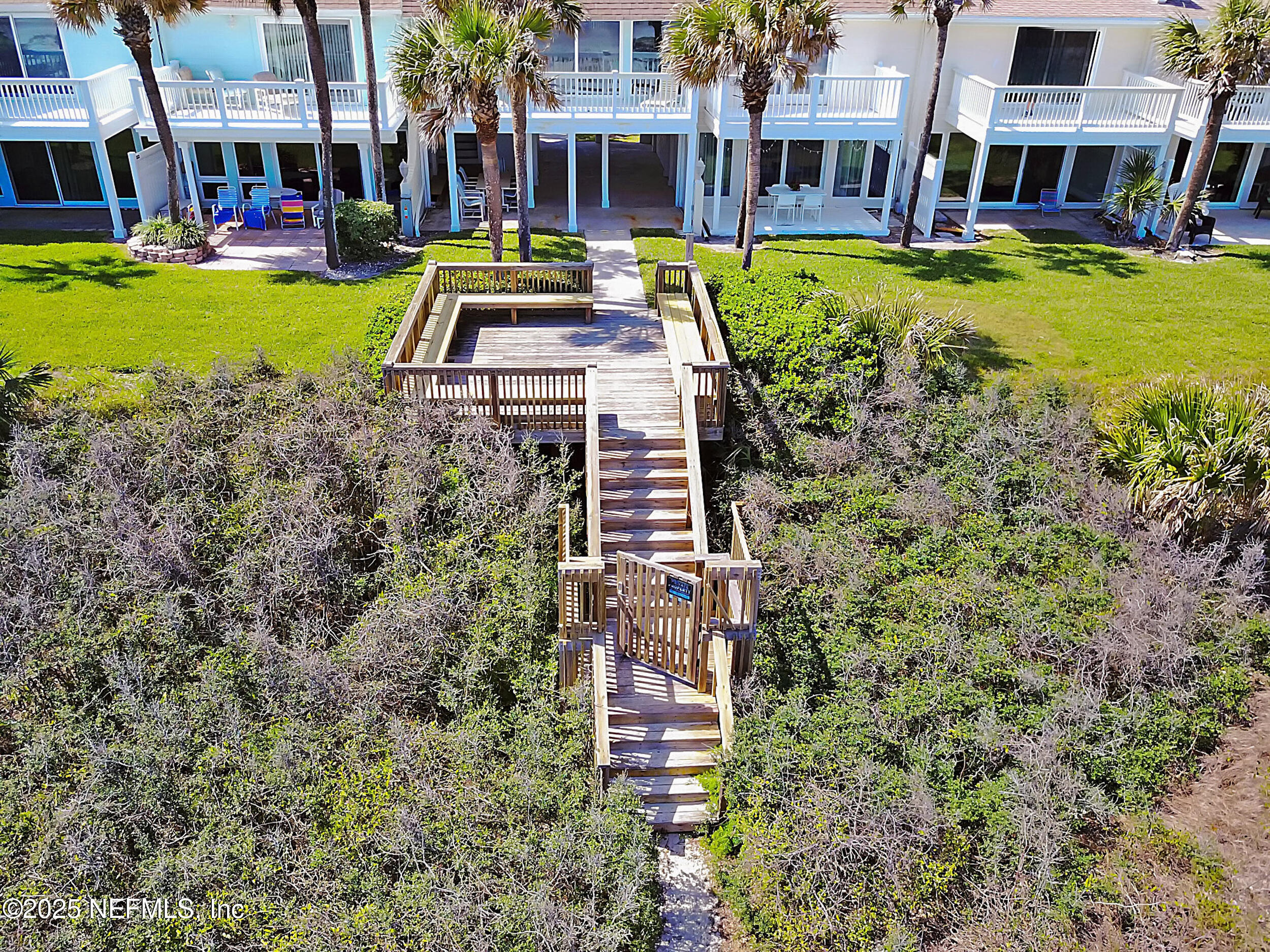 2233 Seminole Road, Unit 3 Atlantic Beach, FL 32233 - Photo 41 of 59 a view of a big yard with plants and large trees