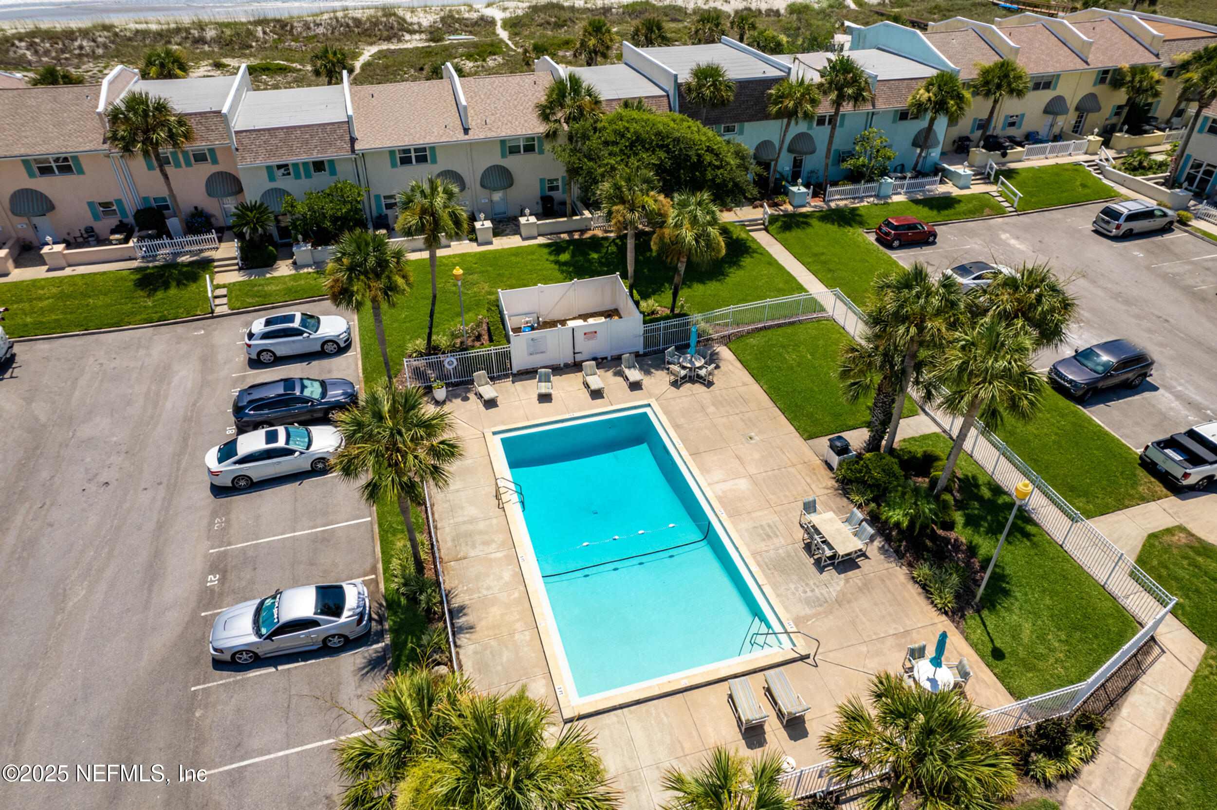 2233 Seminole Road, Unit 3 Atlantic Beach, FL 32233 - Photo 42 of 59 an aerial view of a house with a garden and swimming pool