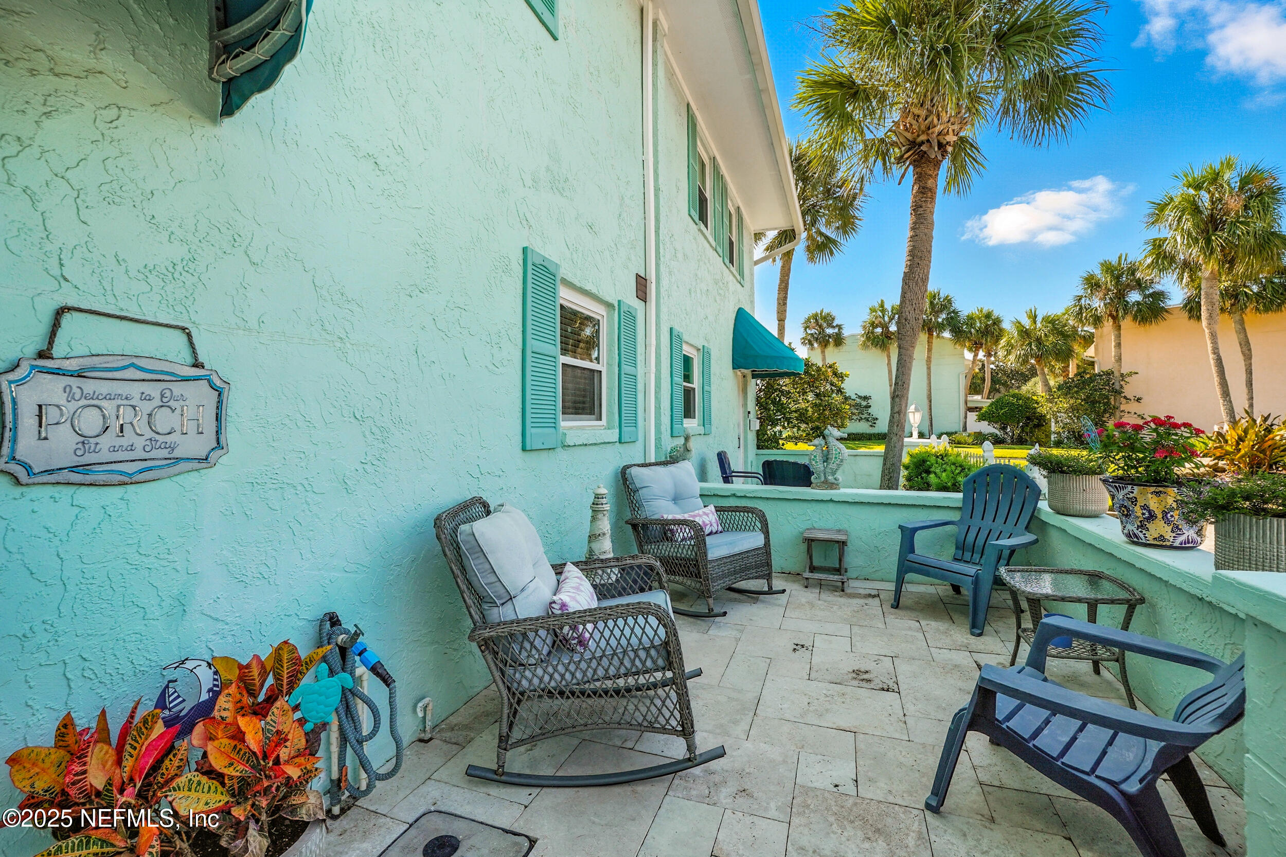 2233 Seminole Road, Unit 3 Atlantic Beach, FL 32233 - Photo 6 of 59 a view of a chairs and table in a patio