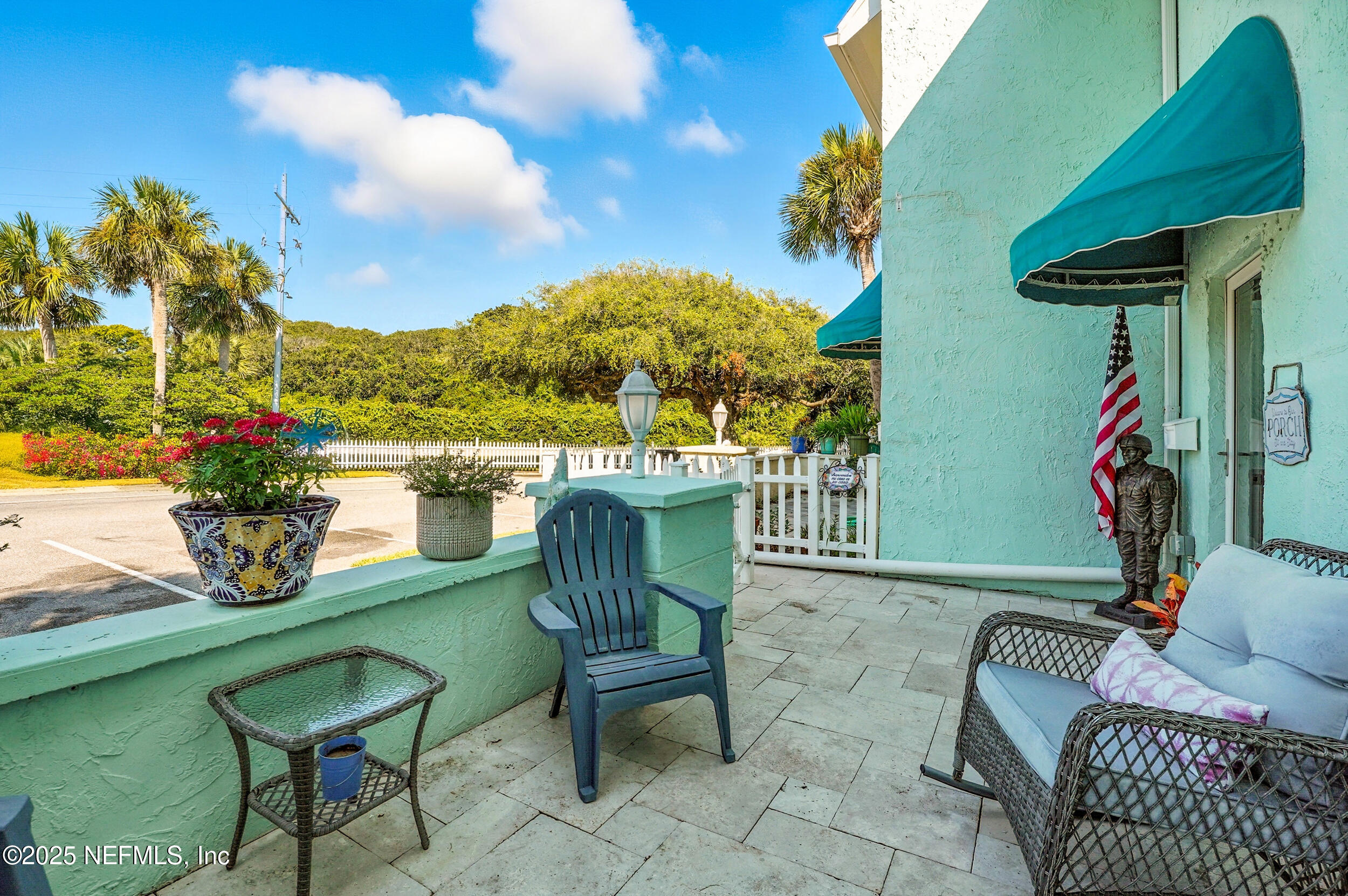 2233 Seminole Road, Unit 3 Atlantic Beach, FL 32233 - Photo 9 of 59 a view of an chairs and tables in the patio