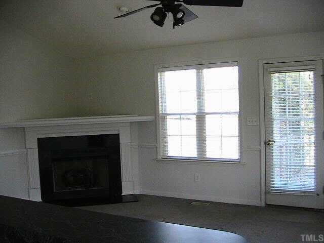 648 Slate Top House Road Clayton, NC 27520 - Photo 7 of 10 From kitchen into living room