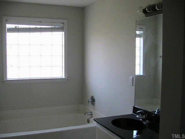 648 Slate Top House Road Clayton, NC 27520 - Photo 8 of 10 Large master bathroom with oversized tub, double sinks, seperate walk-in shower