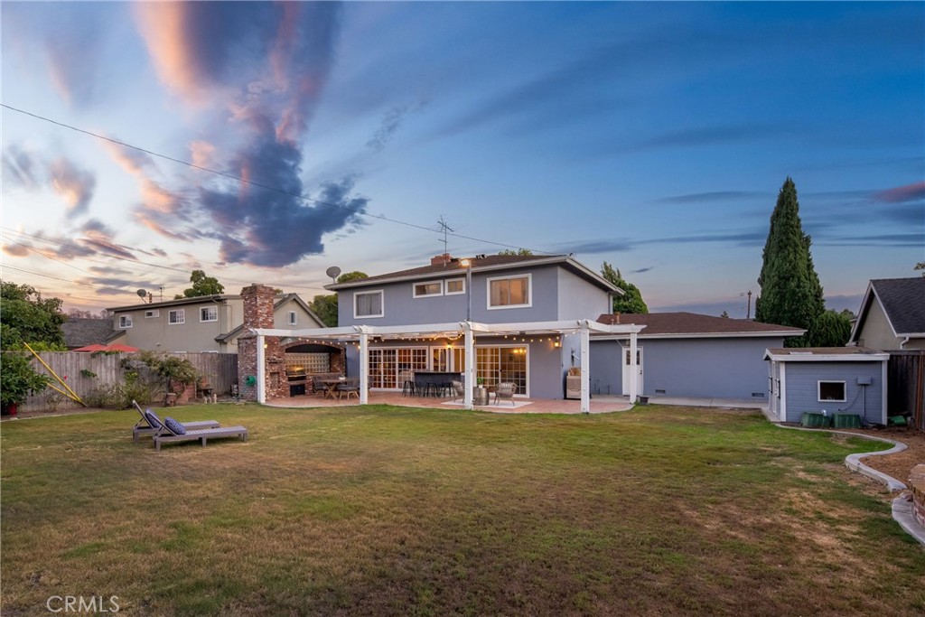 1856 Paros Circle Costa Mesa, CA 92626 - Photo 4 of 35 a view of a house with a yard and sitting area