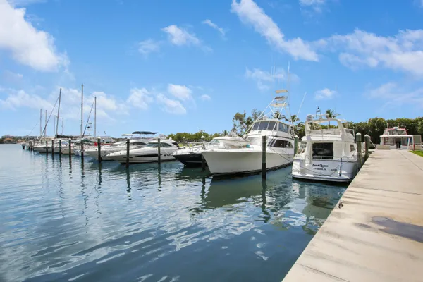a view of a lake with outdoor seating space