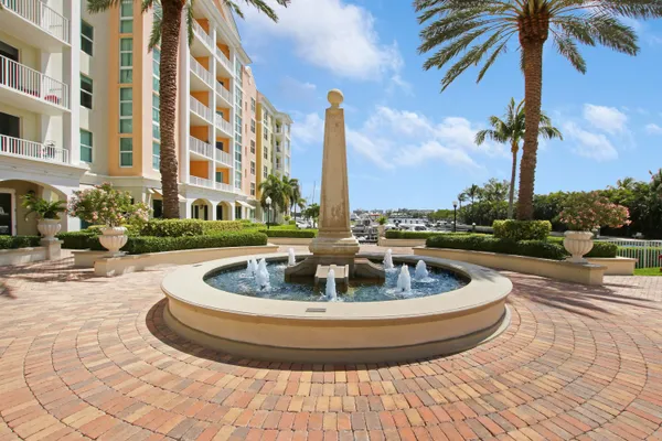 a view of a swimming pool with a yard