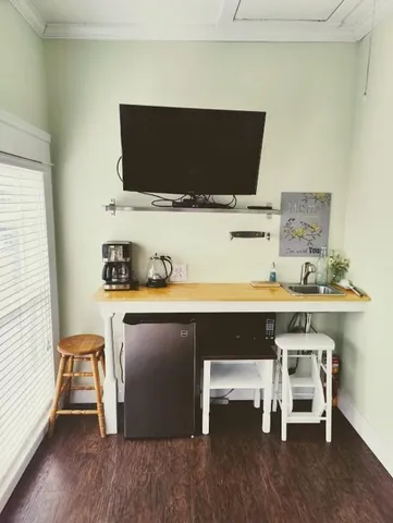 a room with a table and chairs
