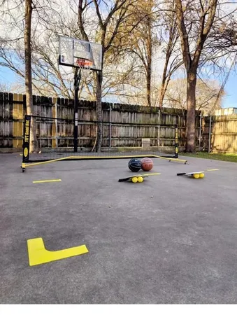 a view of a park with swings and slides