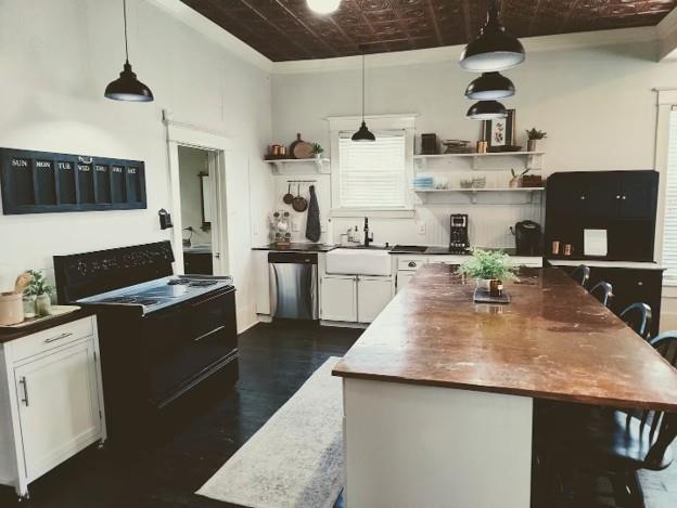 617 South 12th Street Waco, TX 76706 - Photo 6 of 28 a kitchen with refrigerator and cabinets