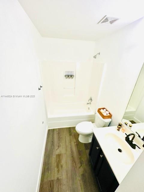 21108 Vía Eden Boca Raton, FL 33433 - Photo 23 of 48 a bathroom with a sink and a toilet