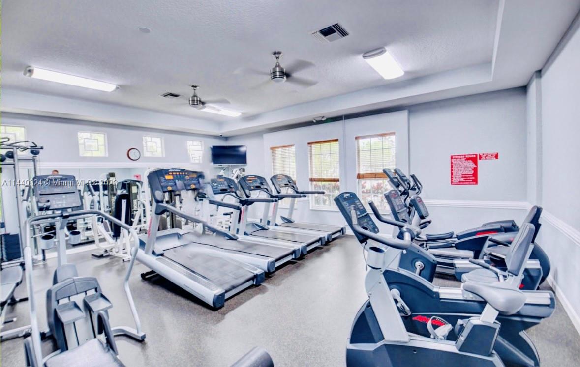 21108 Vía Eden Boca Raton, FL 33433 - Photo 44 of 48 a view of a room with gym equipment