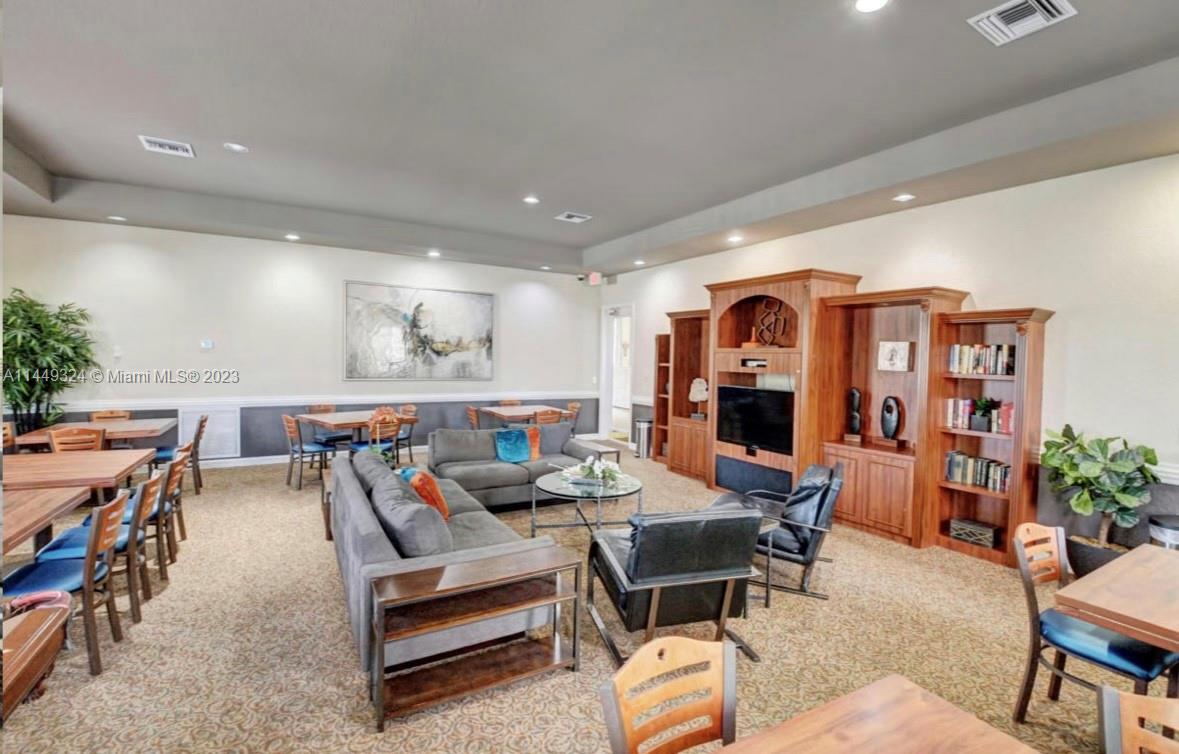 21108 Vía Eden Boca Raton, FL 33433 - Photo 46 of 48 a living room with furniture and wooden floor