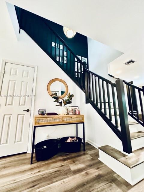 21108 Vía Eden Boca Raton, FL 33433 - Photo 6 of 48 a view of entryway and hall with wooden floor