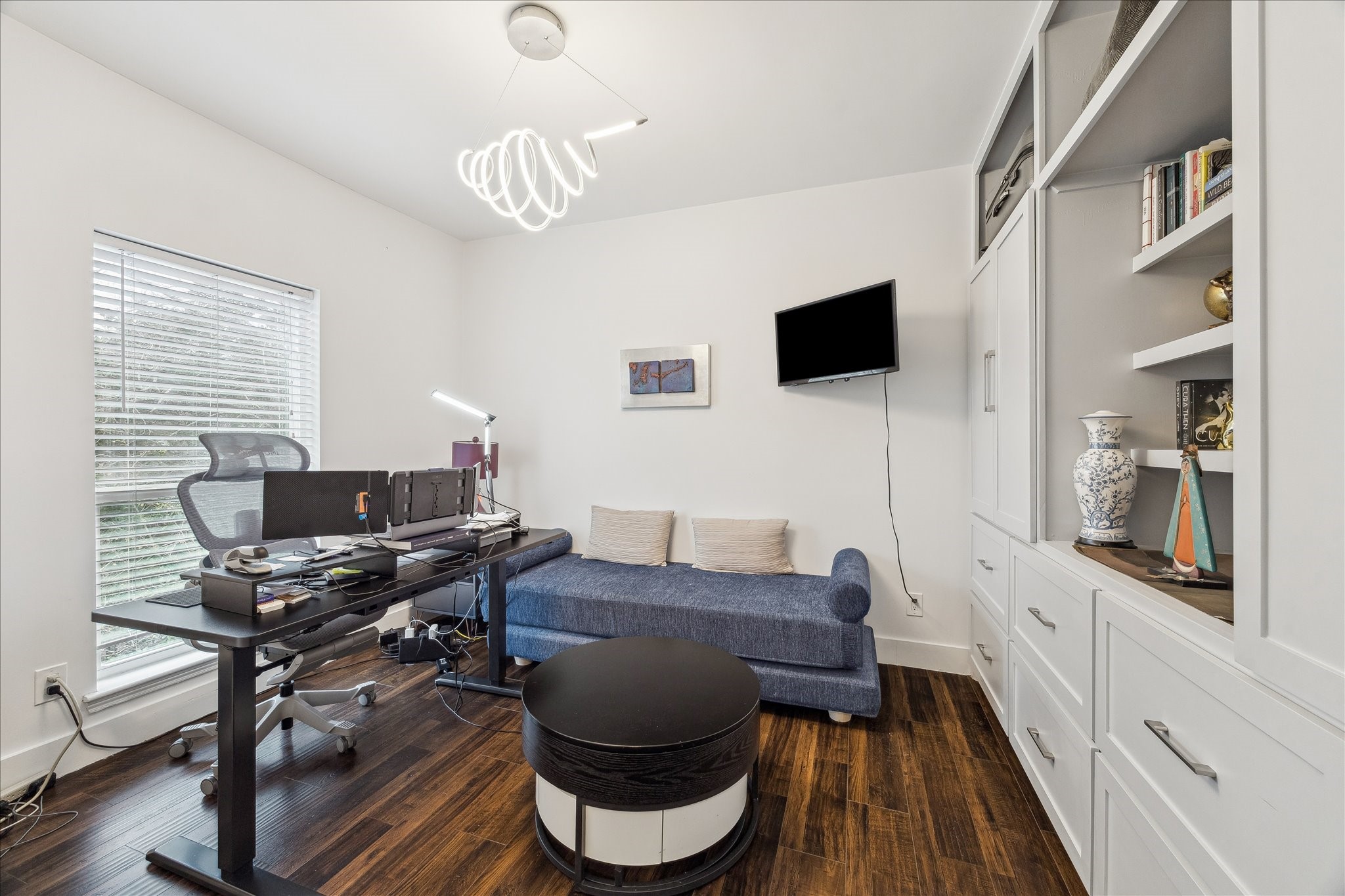 2100 Tanglewilde Street, Unit 373 Houston, TX 77063 - Photo 16 of 21 Third Bedroom also makes a great home office with built-in shelving and cabinet