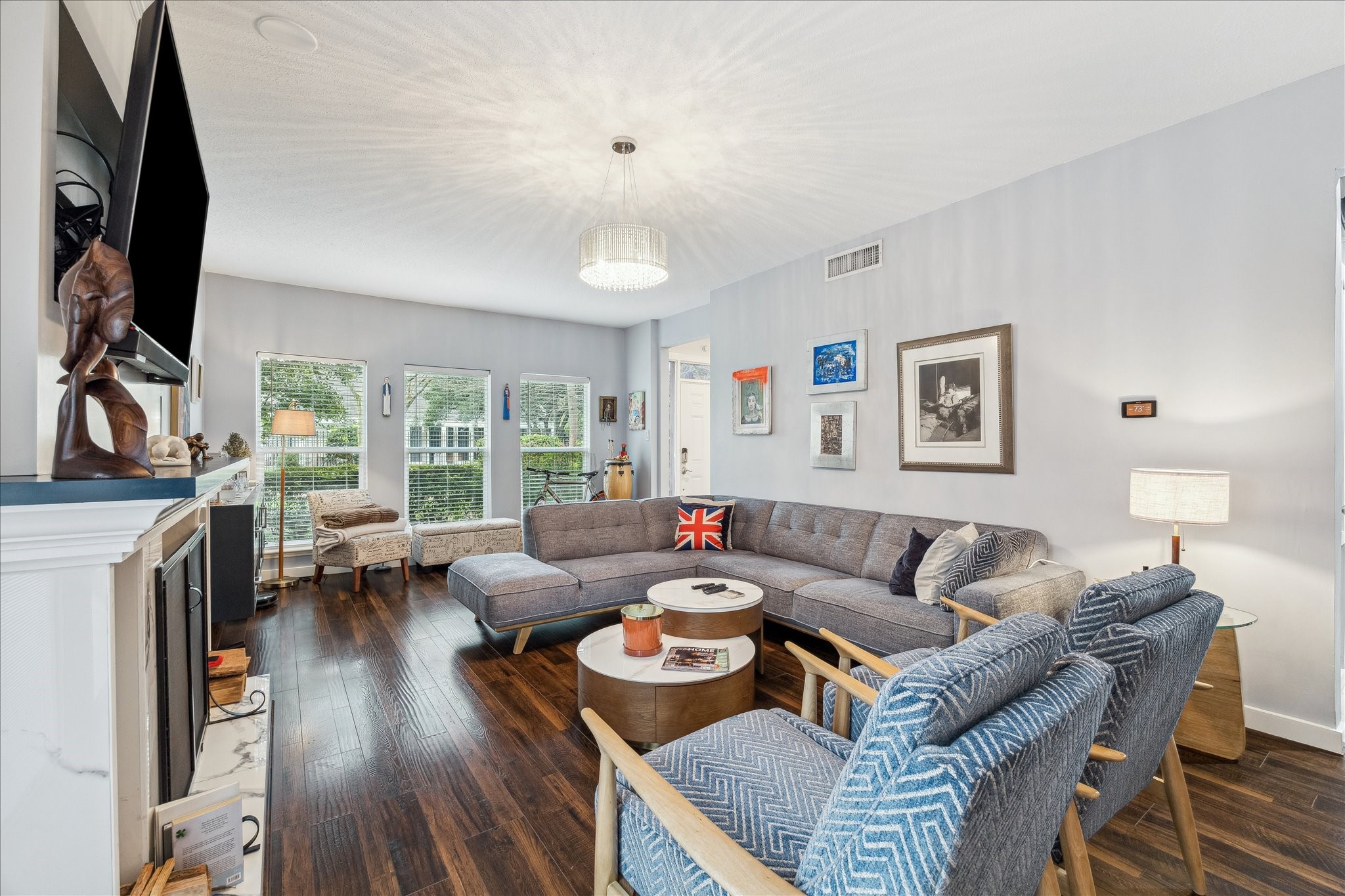 2100 Tanglewilde Street, Unit 373 Houston, TX 77063 - Photo 5 of 21 View of Family room looking to front of townhome with 4 large windows allowing lots of natural lighting