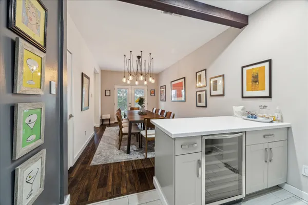a view of a kitchen and dining room