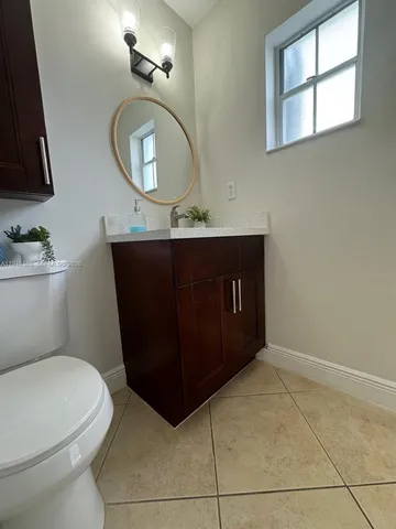 a utility room with washing machine