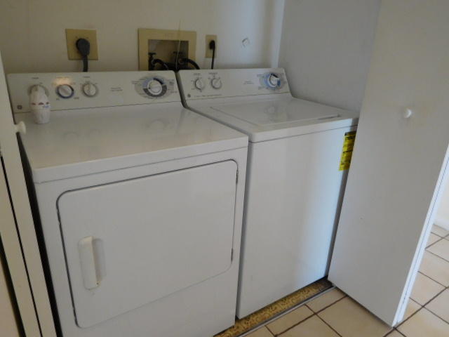11504 Whisper Sound Drive Boca Raton, FL 33428 - Photo 11 of 32 a utility room with dryer and washer