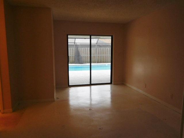 11504 Whisper Sound Drive Boca Raton, FL 33428 - Photo 12 of 32 a view of an empty room and window