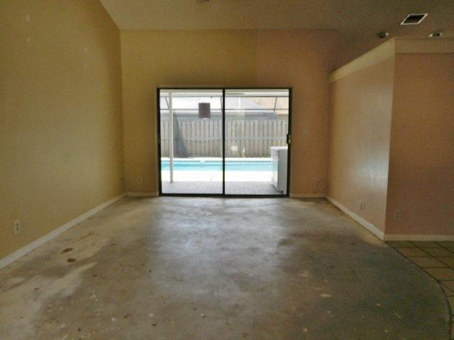11504 Whisper Sound Drive Boca Raton, FL 33428 - Photo 2 of 32 a view of empty room with sliding door