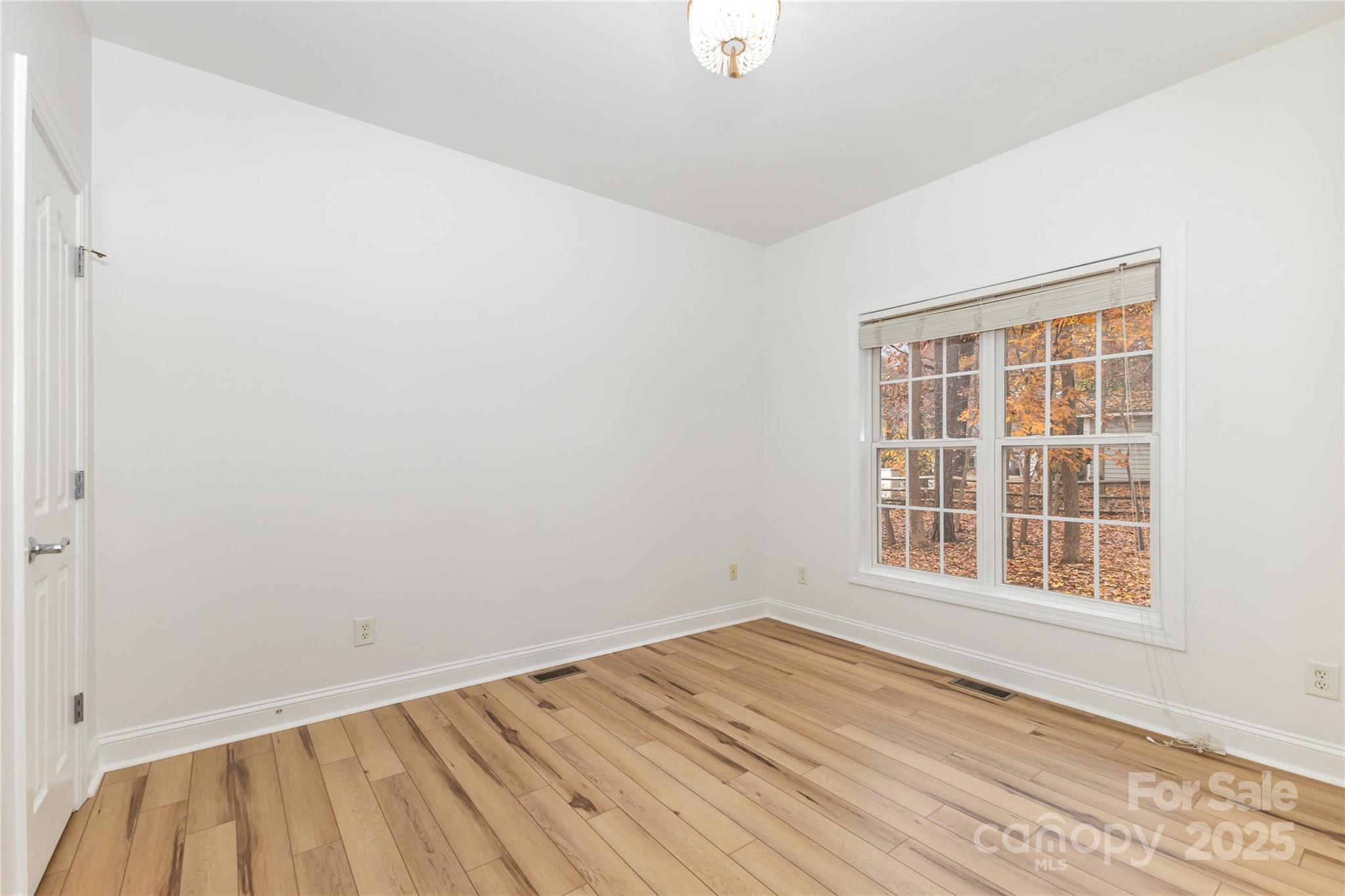 884 Clonmel Drive Matthews, NC 28104 - Photo 16 of 48 an empty room with a window
