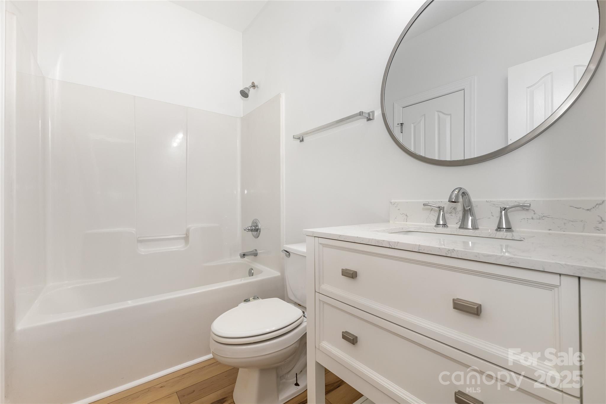 884 Clonmel Drive Matthews, NC 28104 - Photo 17 of 48 a bathroom with a sink a toilet and a mirror