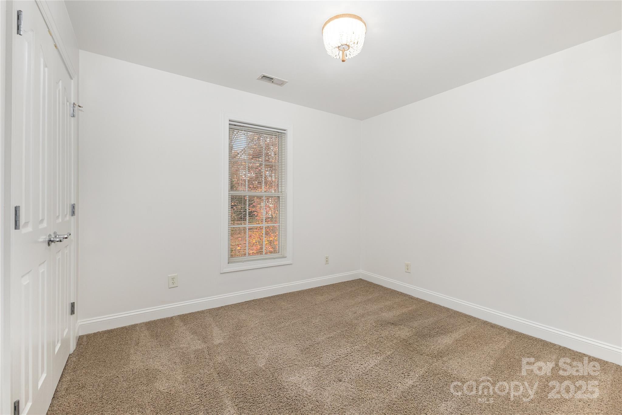 884 Clonmel Drive Matthews, NC 28104 - Photo 29 of 48 an empty room with a window